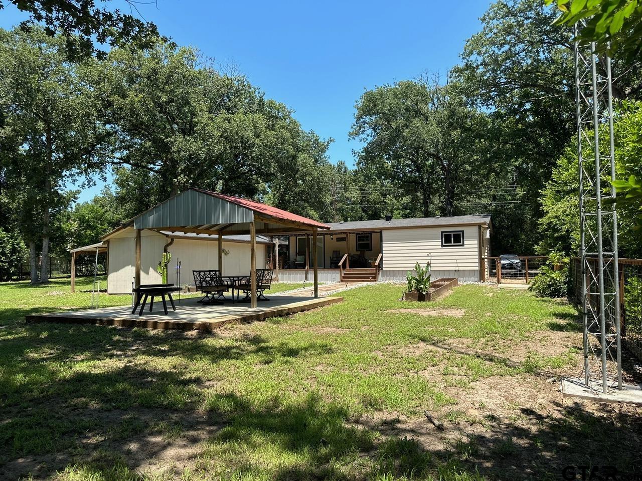 223 Holly Glen Murchison, TX 75778 - Photo 28 of 34 a house that has a big yard