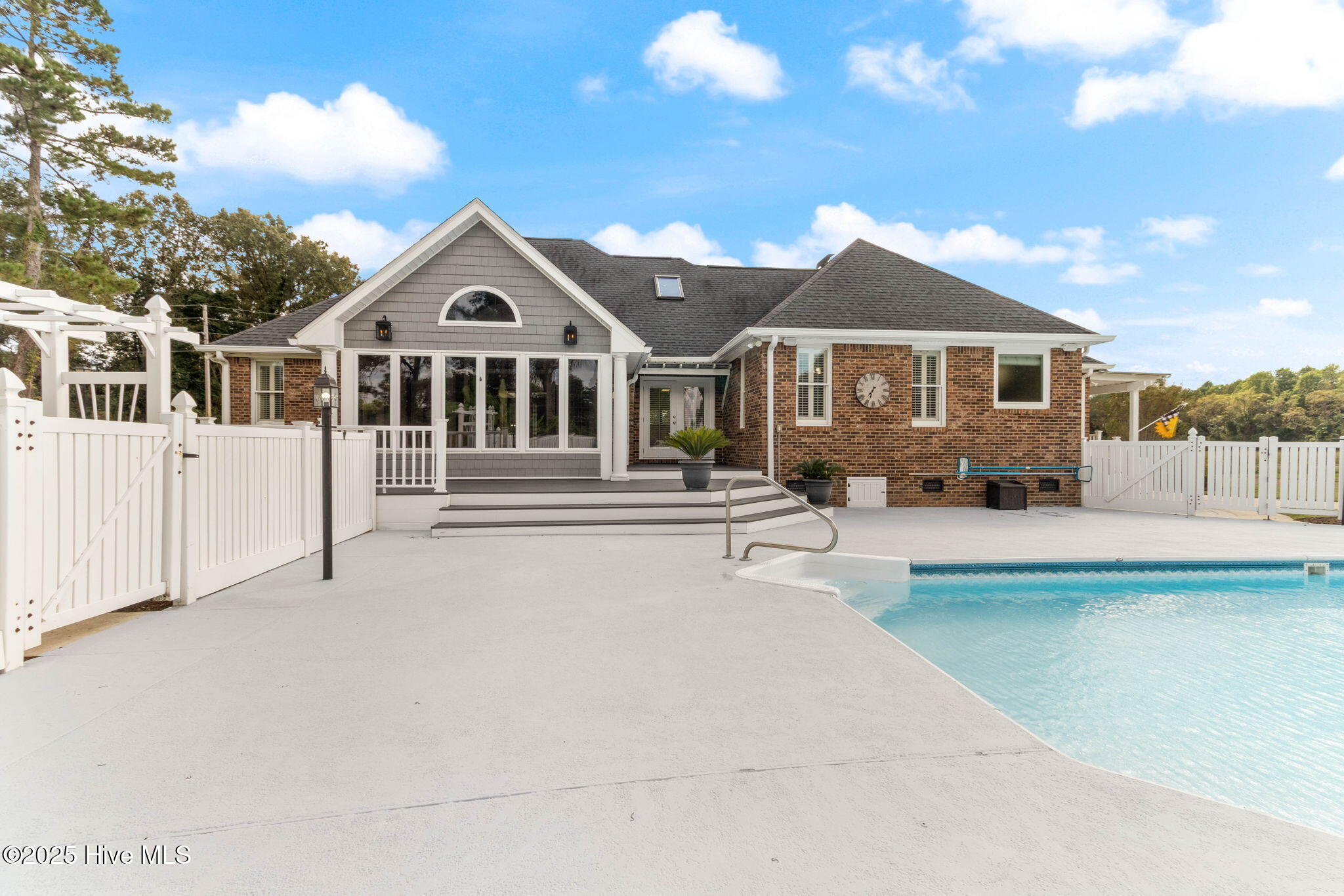 2198 Bill Hooks Road Whiteville, NC 28472 - Photo 44 of 56 Large Deck and Sunroom Overlooking Pool