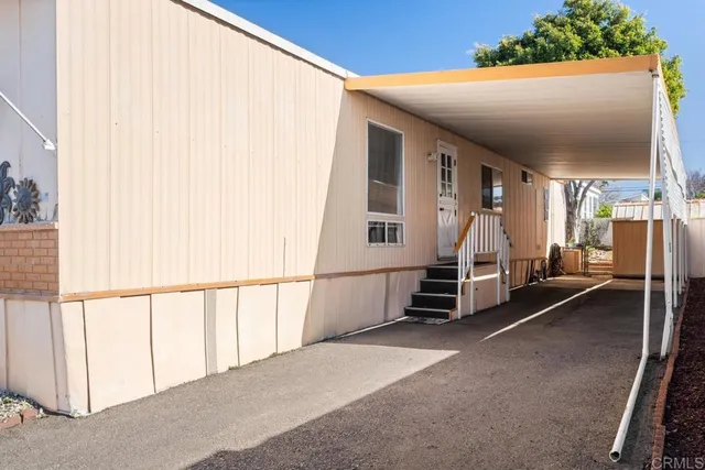 a view of a house with a street