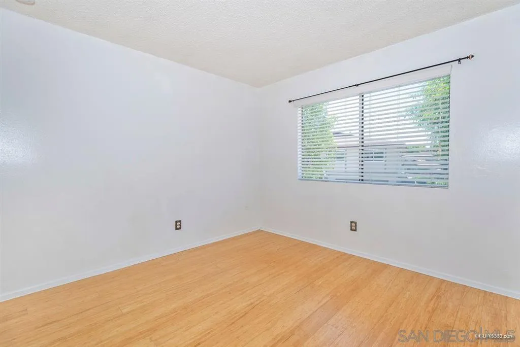 9845 Mission Gorge Road, Unit 4 Santee, CA 92071 - Photo 18 of 25 a view of an empty room with a window