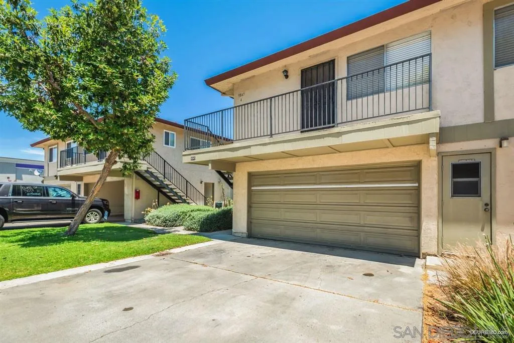 9845 Mission Gorge Road, Unit 4 Santee, CA 92071 - Photo 3 of 25 a view of a house with a yard
