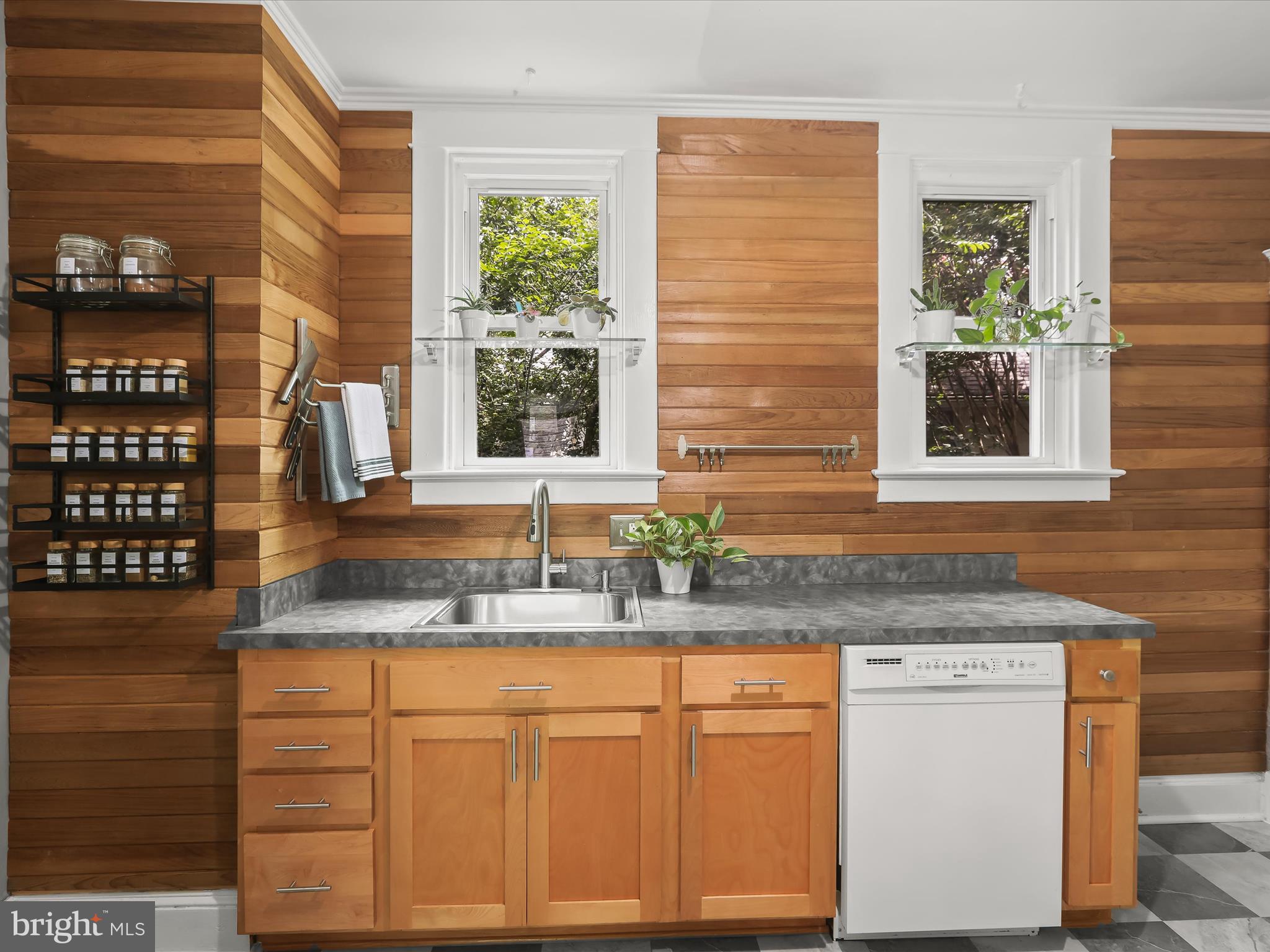 8 Edmondson Ridge Road Catonsville, MD 21228 - Photo 20 of 50 a kitchen with granite countertop cabinets sink and window