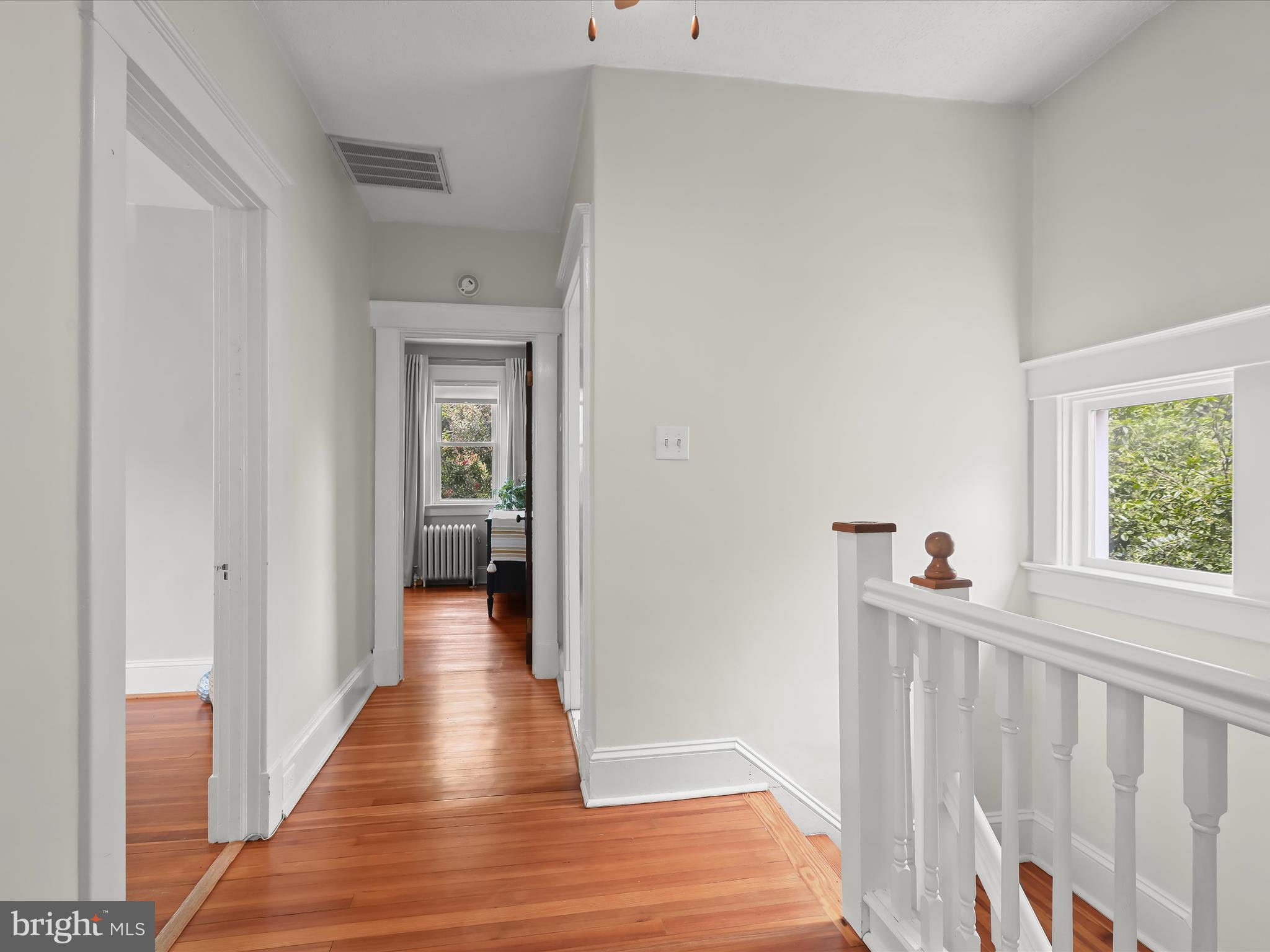 8 Edmondson Ridge Road Catonsville, MD 21228 - Photo 24 of 50 a view of a hallway view with wooden floor and staircase