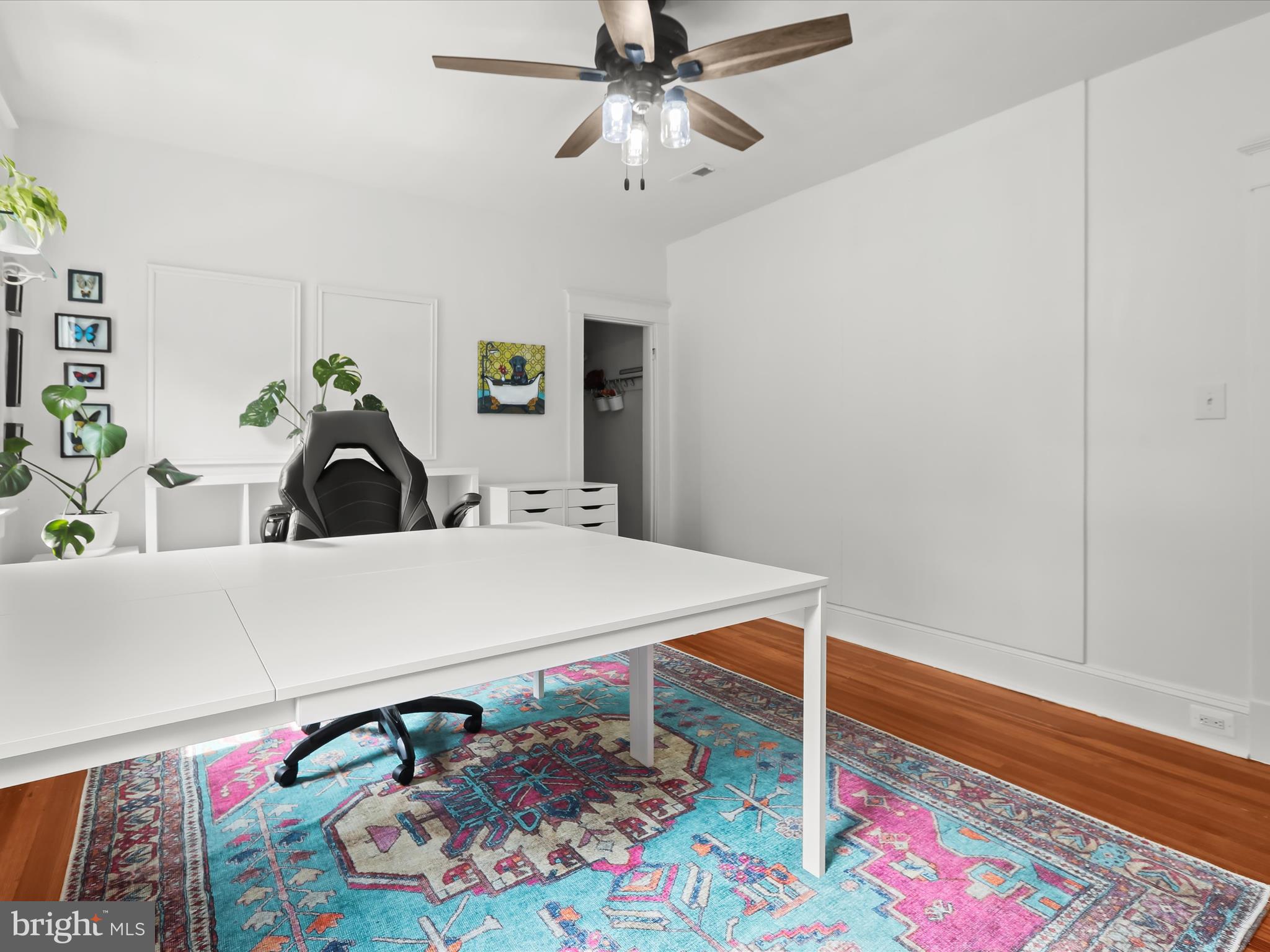 8 Edmondson Ridge Road Catonsville, MD 21228 - Photo 28 of 50 a bedroom with a bed and a chandelier
