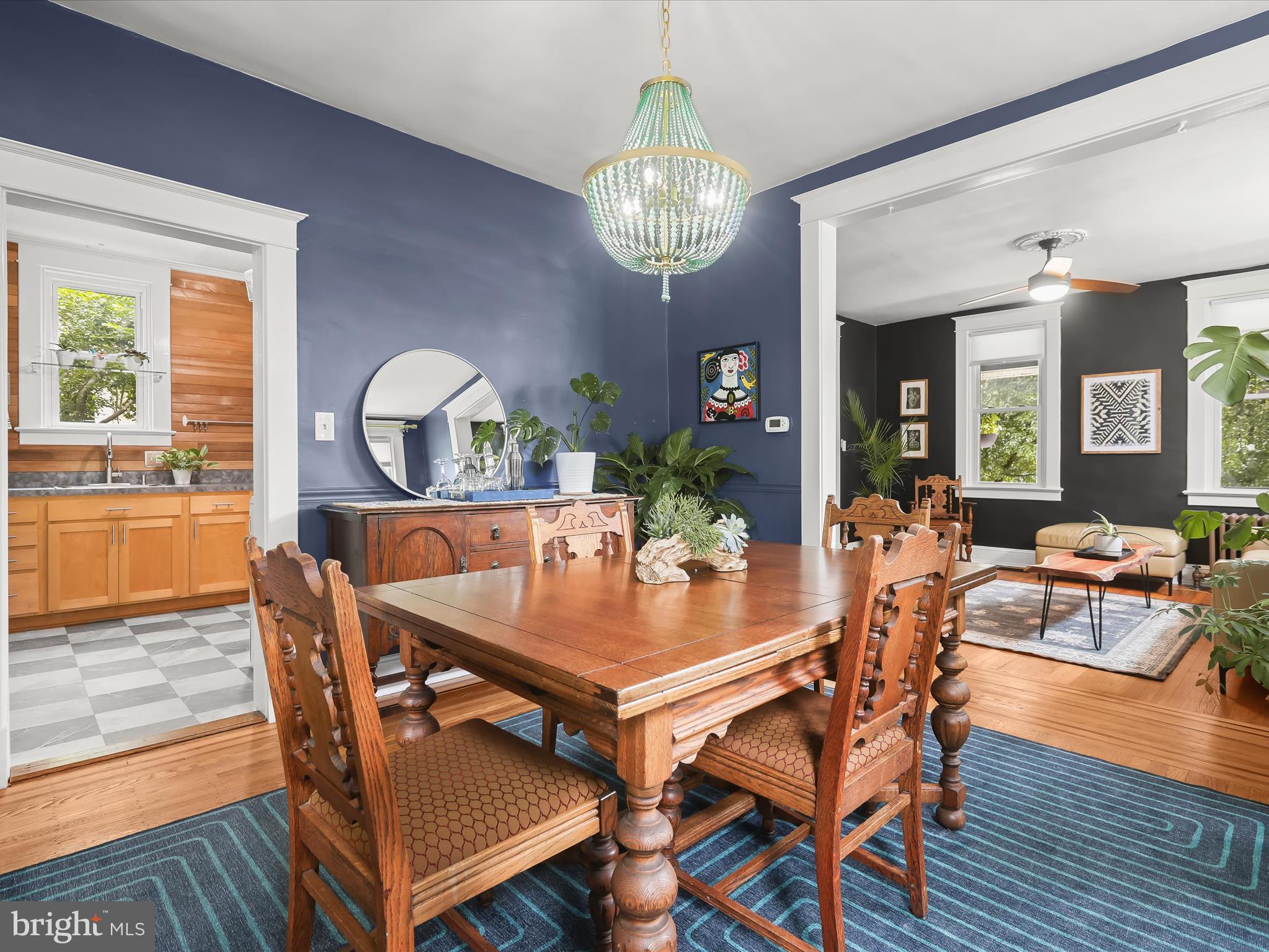 8 Edmondson Ridge Road Catonsville, MD 21228 - Photo 3 of 50 a view of a dining room with furniture a chandelier and wooden floor