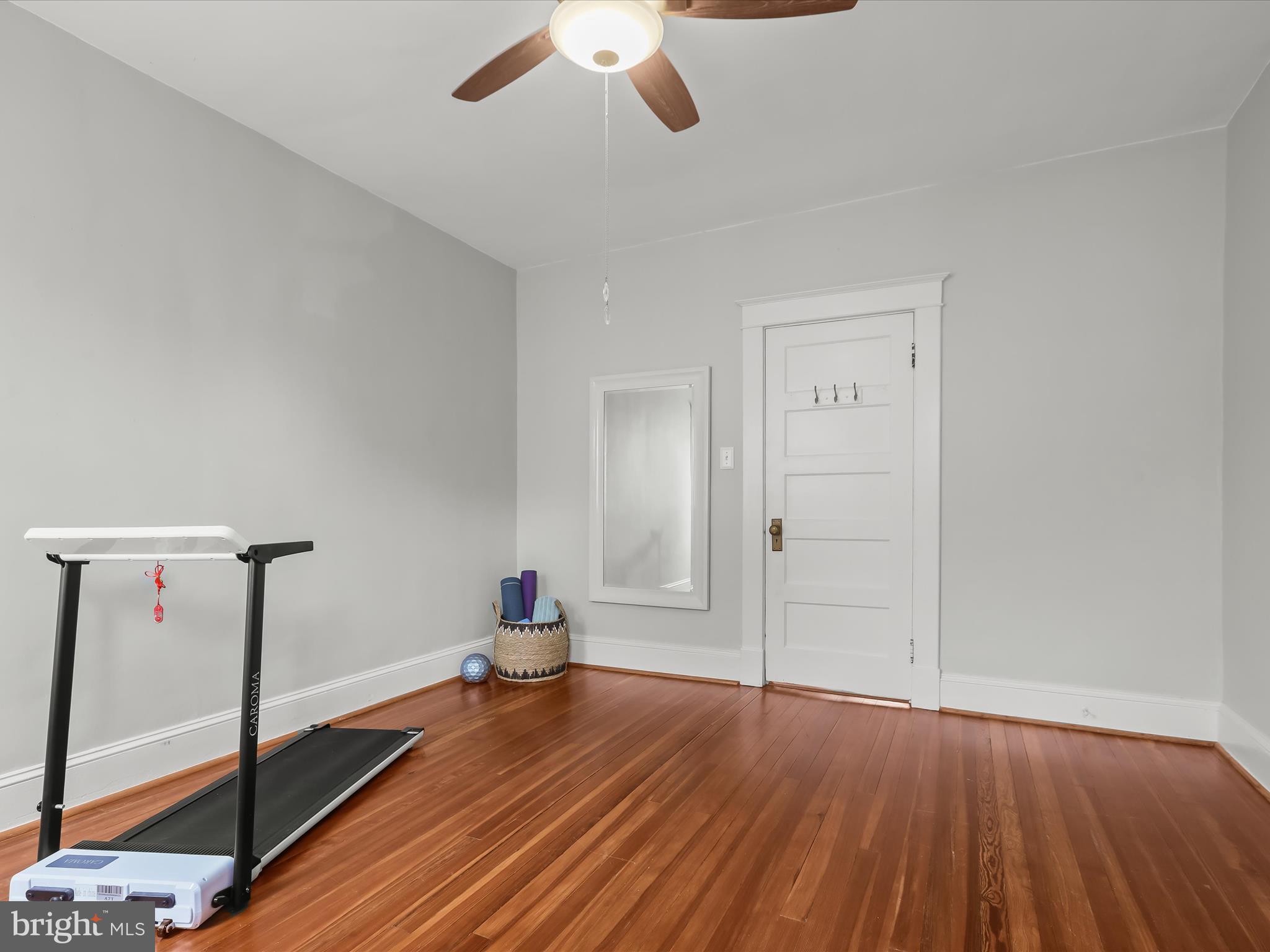 8 Edmondson Ridge Road Catonsville, MD 21228 - Photo 31 of 50 a view of empty room with wooden floor