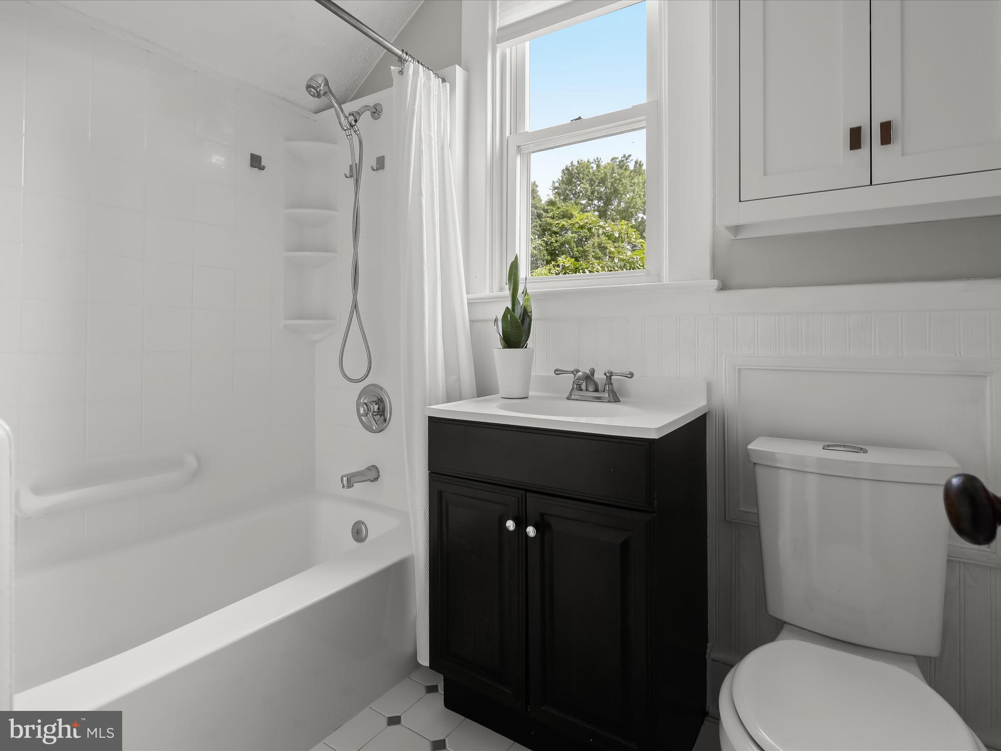 8 Edmondson Ridge Road Catonsville, MD 21228 - Photo 32 of 50 a bathroom with a sink toilet and shower