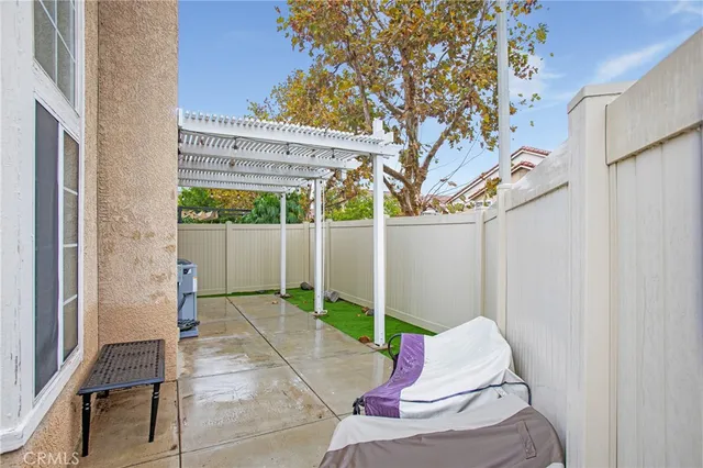 a backyard of a house with seating space