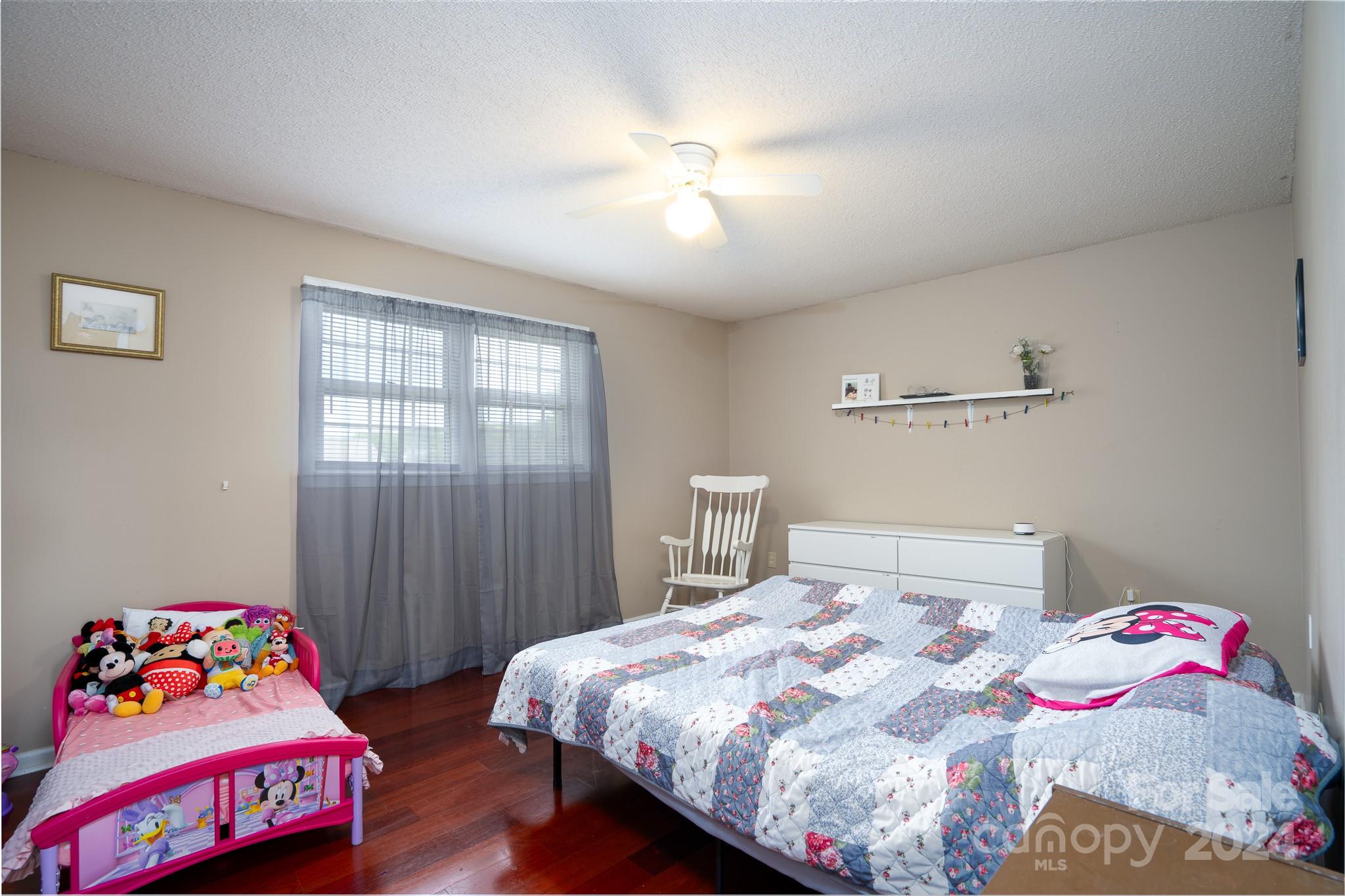 130 Log Barn Road Salisbury, NC 28146 - Photo 11 of 22 a bedroom with a bed and a dresser in it