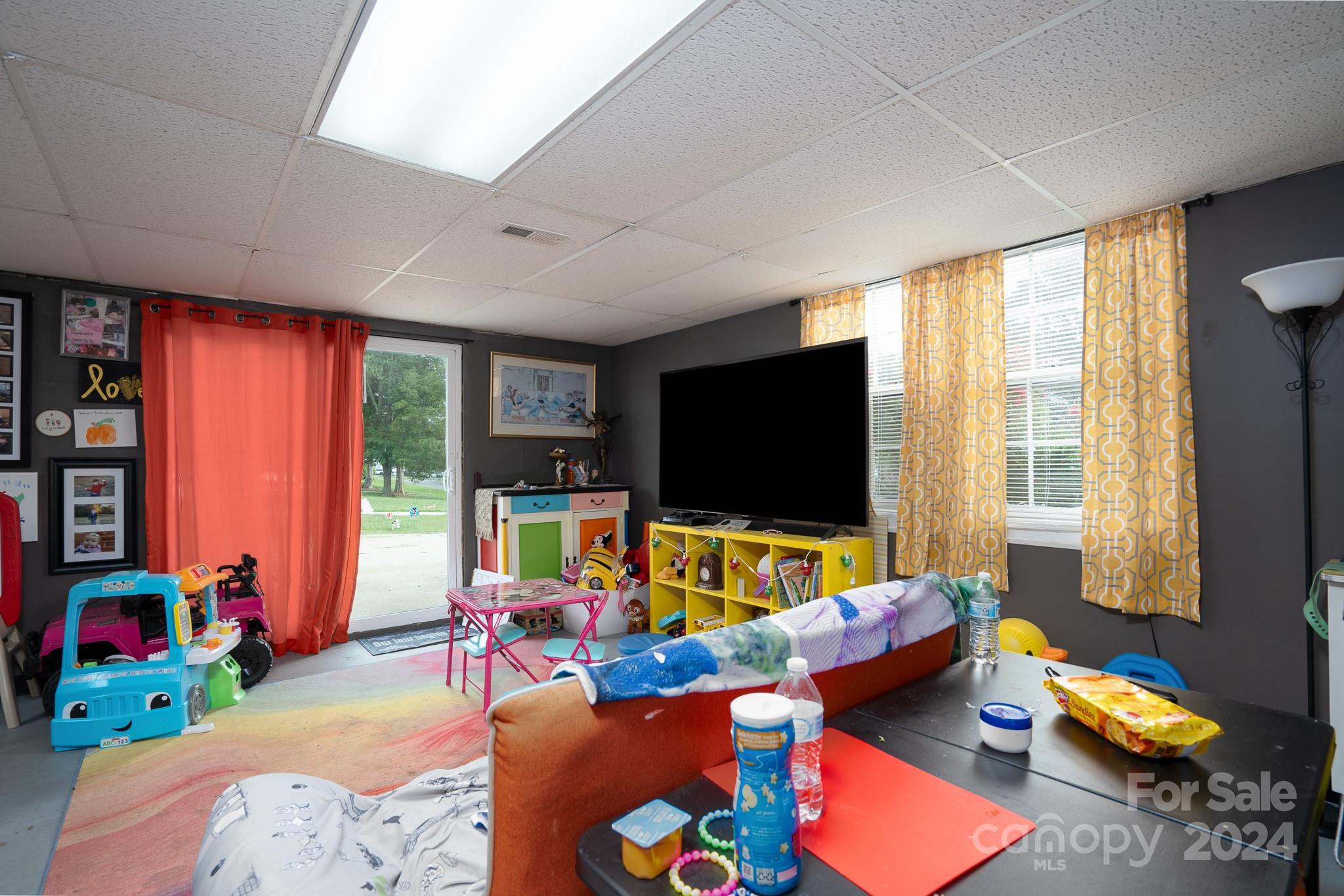 130 Log Barn Road Salisbury, NC 28146 - Photo 16 of 22 a living room with furniture and a flat screen tv