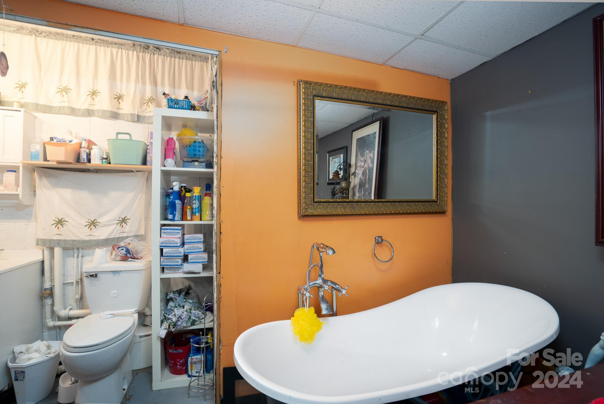 130 Log Barn Road Salisbury, NC 28146 - Photo 18 of 22 a bathroom with a toilet sink and mirror