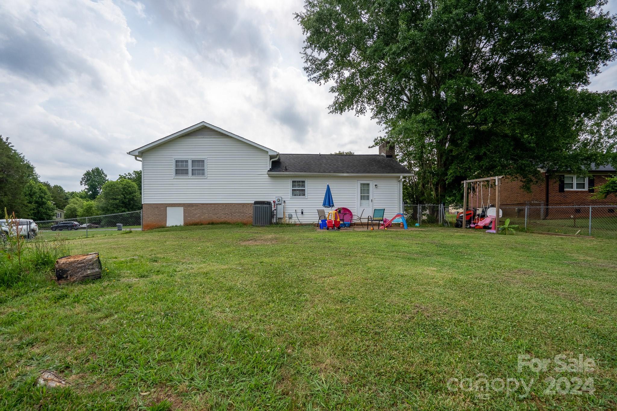 130 Log Barn Road Salisbury, NC 28146 - Photo 19 of 22 a front view of house with yard and trees