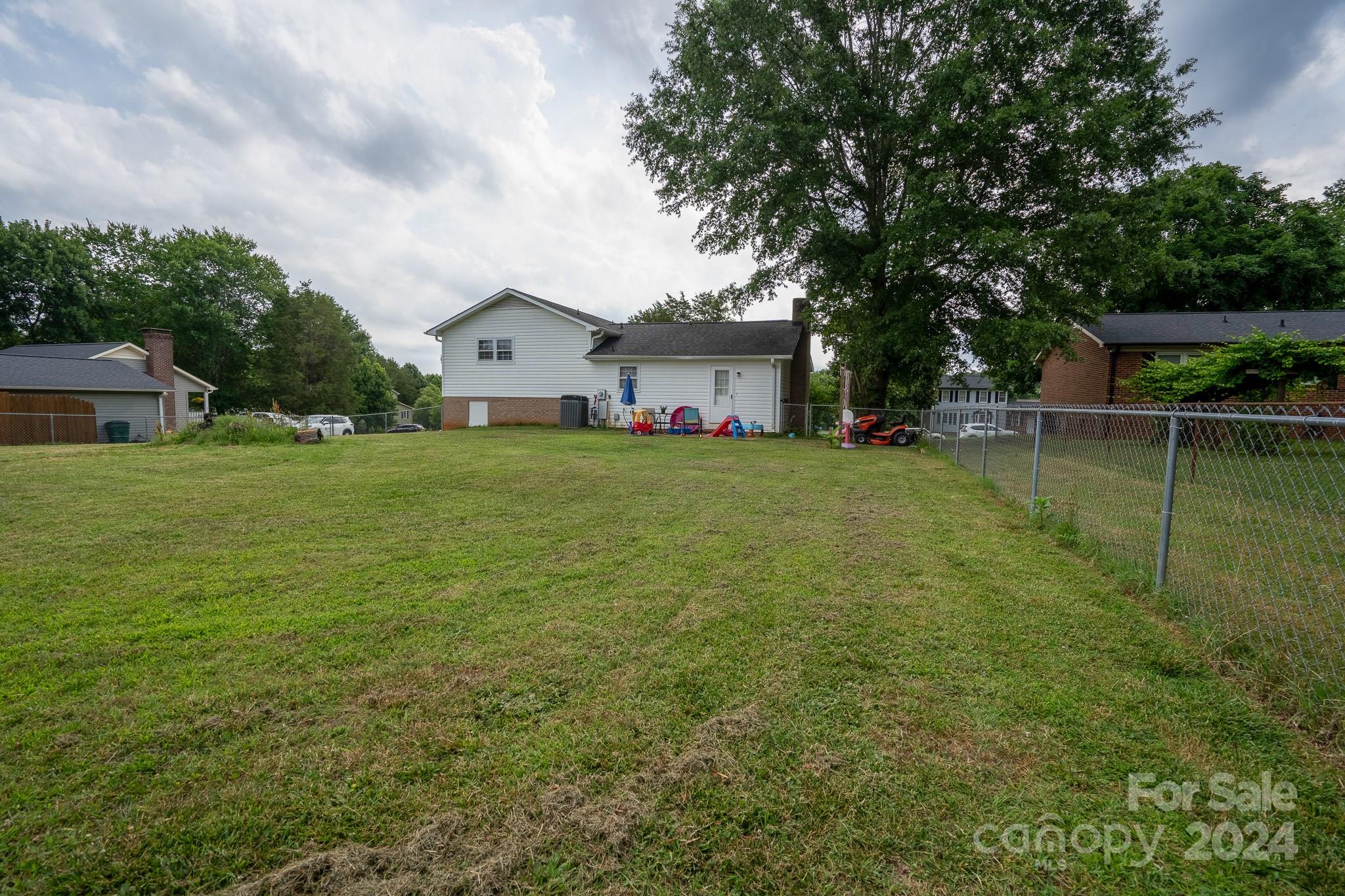 130 Log Barn Road Salisbury, NC 28146 - Photo 20 of 22 a view of a house with a yard