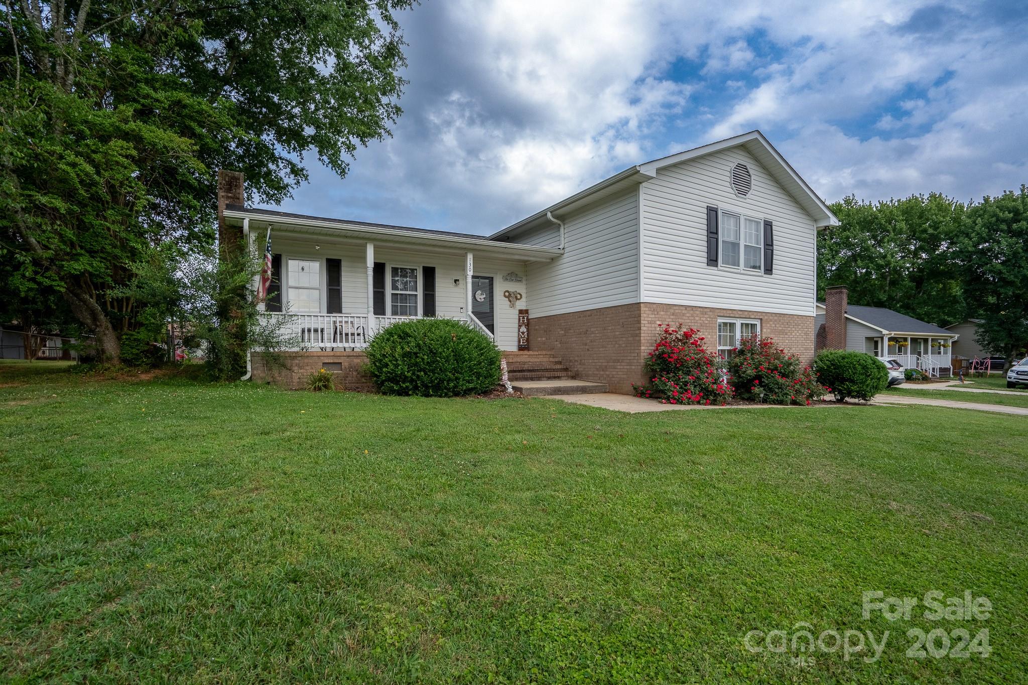 130 Log Barn Road Salisbury, NC 28146 - Photo 21 of 22 a view of a house with backyard and garden