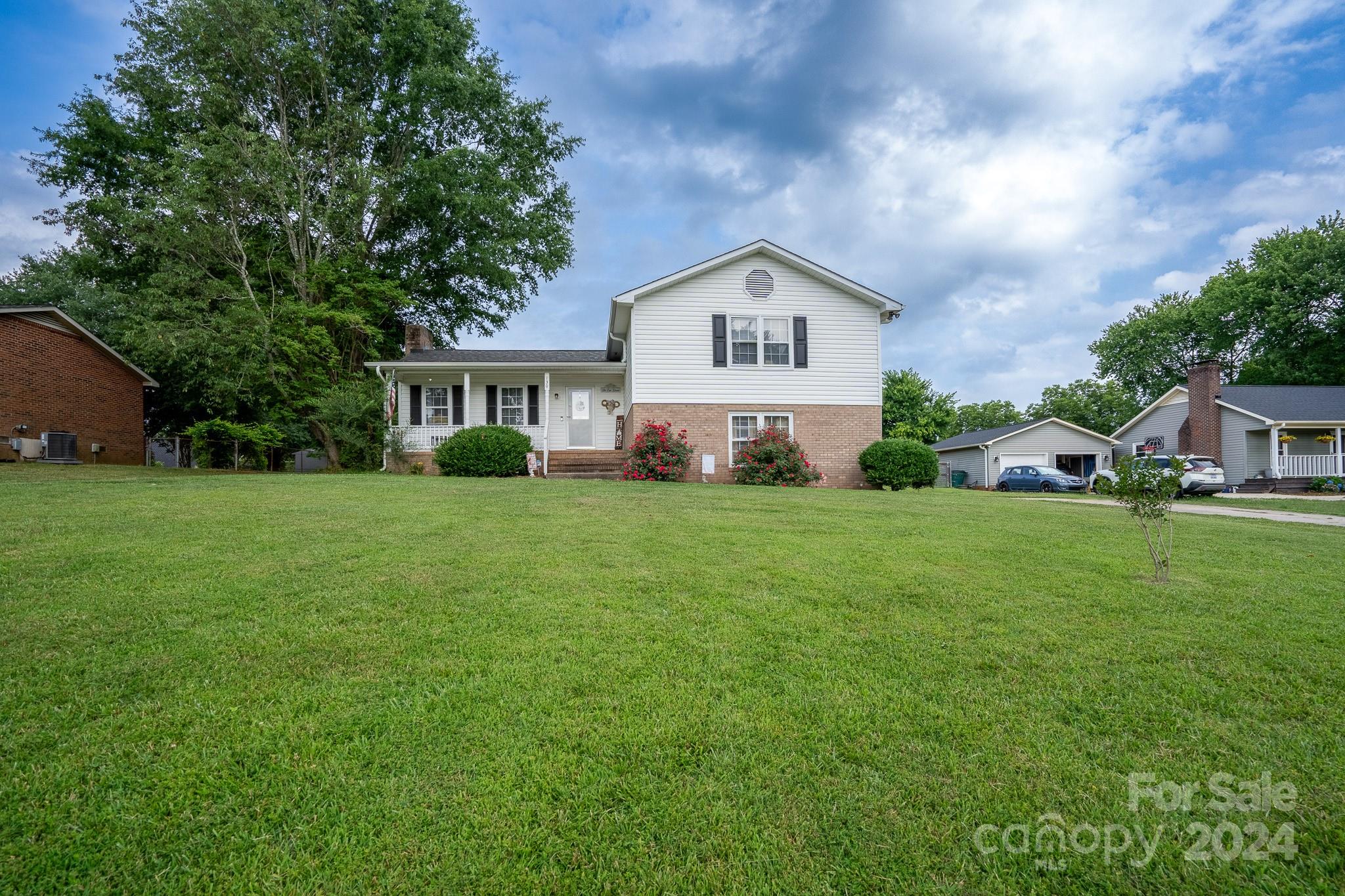 130 Log Barn Road Salisbury, NC 28146 - Photo 22 of 22 a front view of a house with a yard and trees