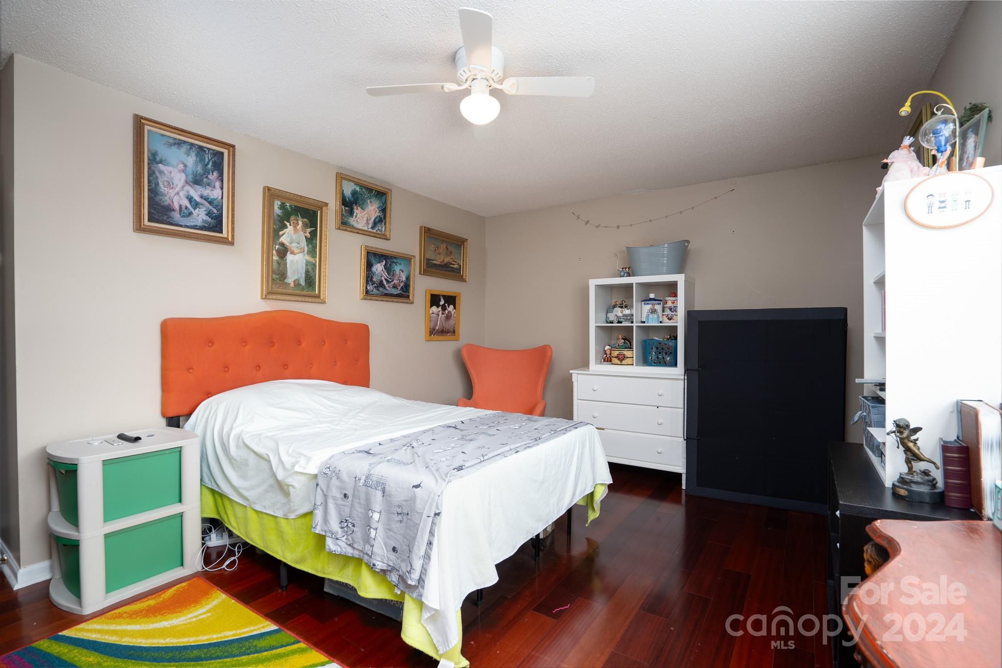 130 Log Barn Road Salisbury, NC 28146 - Photo 8 of 22 a bedroom with a bed and wooden floor