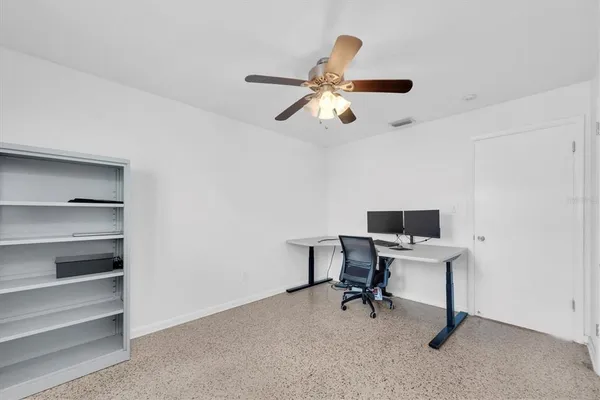 a view of a livingroom with a workspace