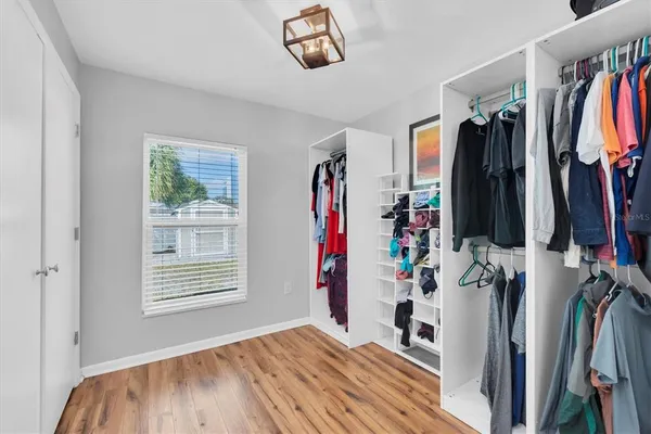 a view of a closet with storage