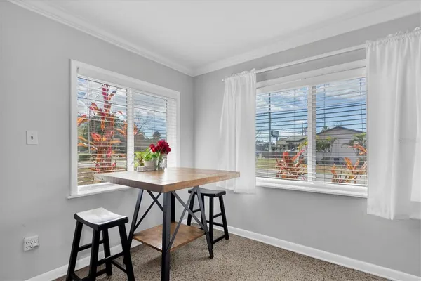 a room with furniture and a window