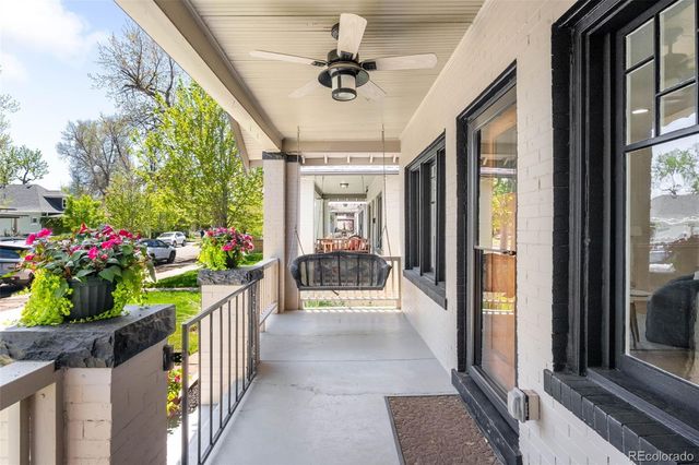a view of a backyard with chairs