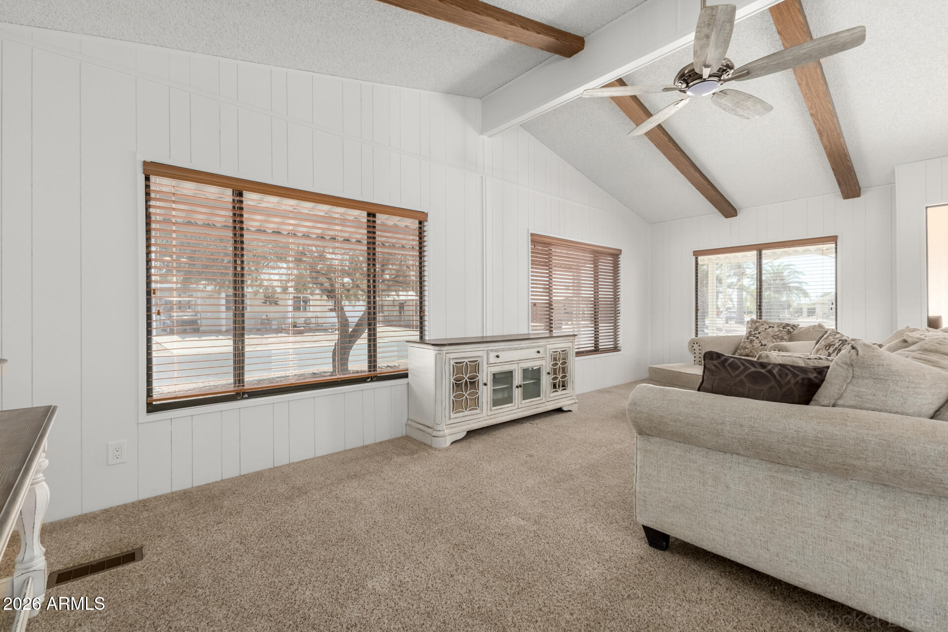 512 South 83rd Way Mesa, AZ 85208 - Photo 13 of 45 a living room with furniture and a large window