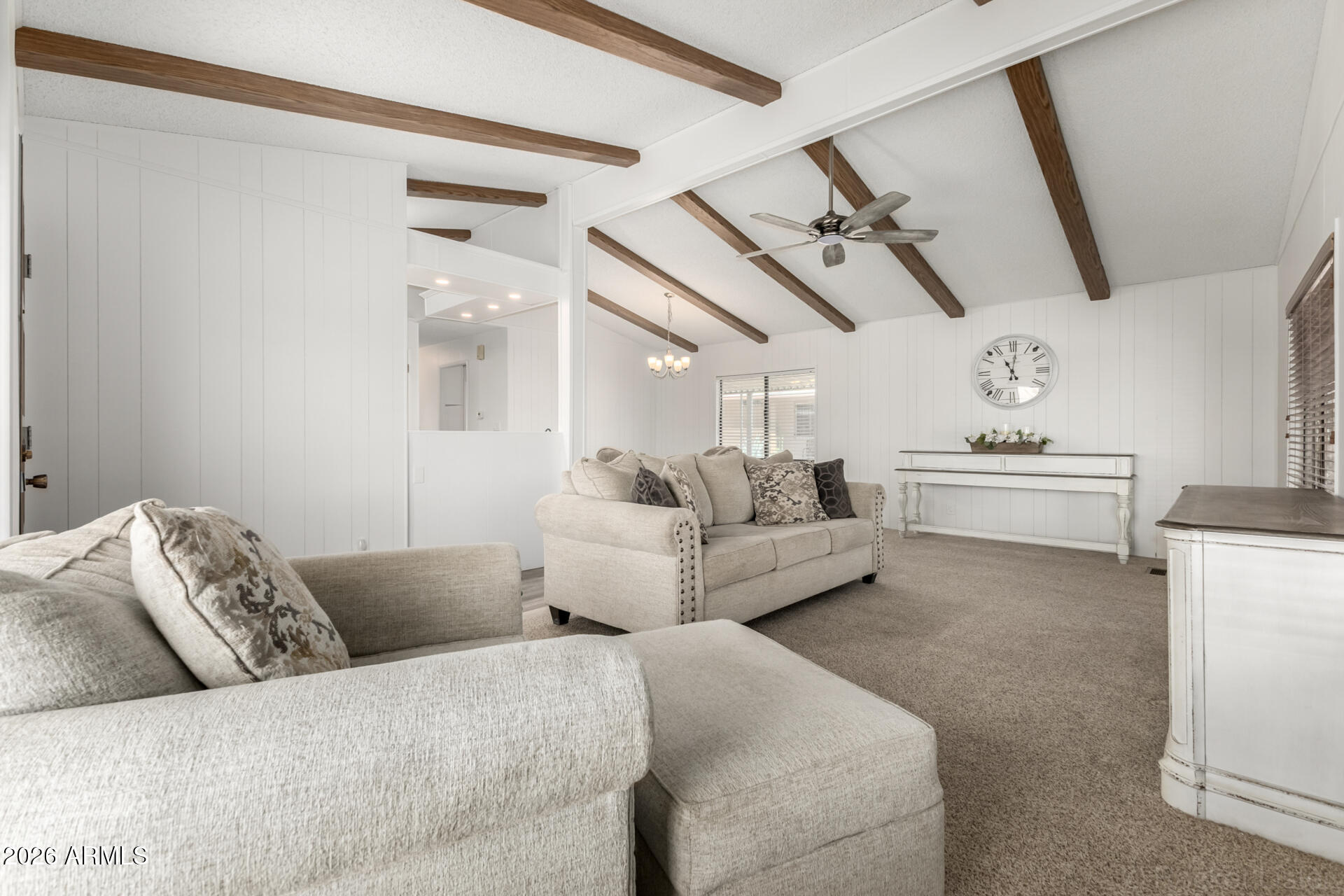 512 South 83rd Way Mesa, AZ 85208 - Photo 14 of 45 a living room with furniture and a ceiling fan