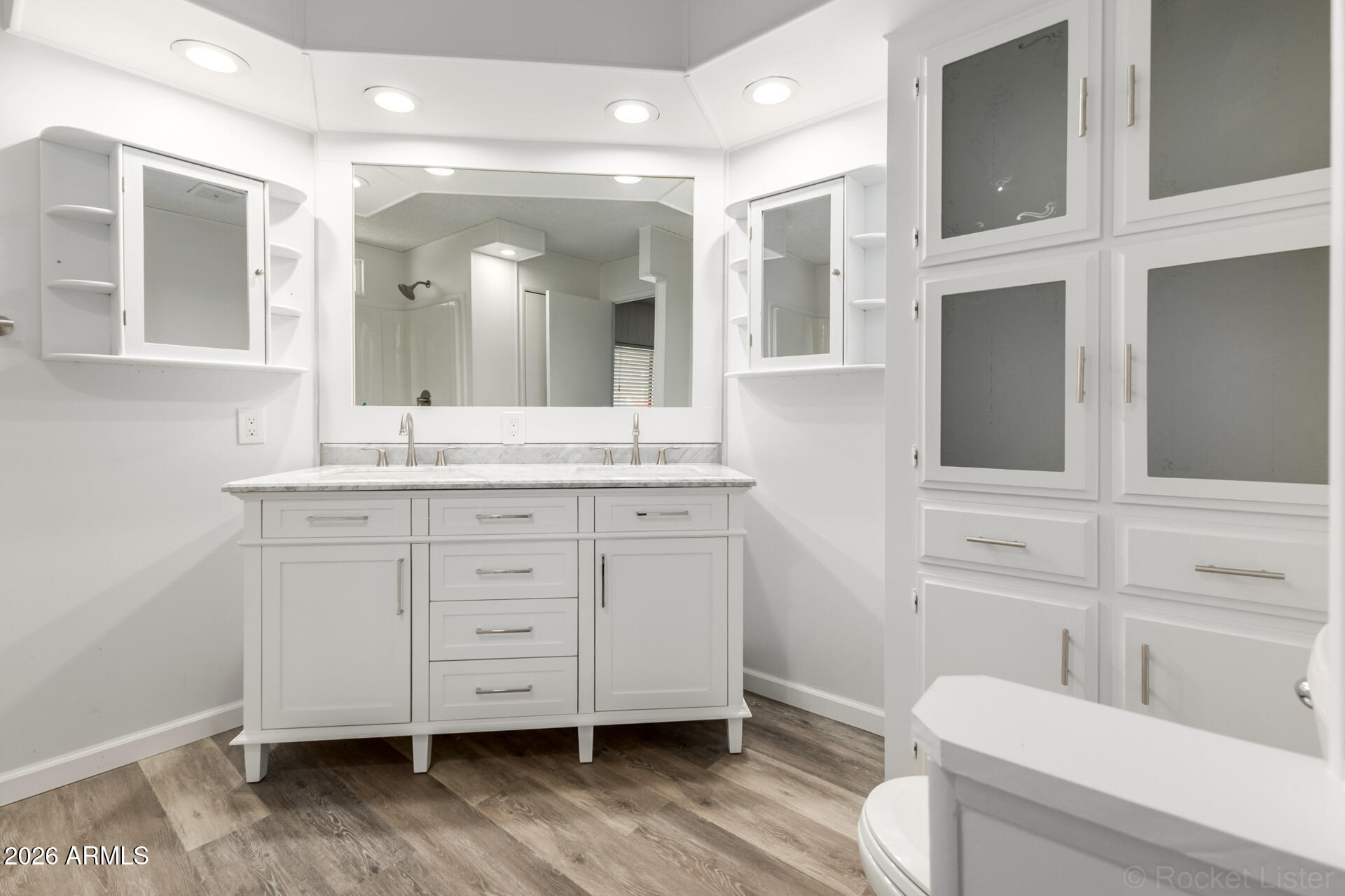 512 South 83rd Way Mesa, AZ 85208 - Photo 25 of 45 a bathroom with a granite countertop sink mirror vanity and toilet