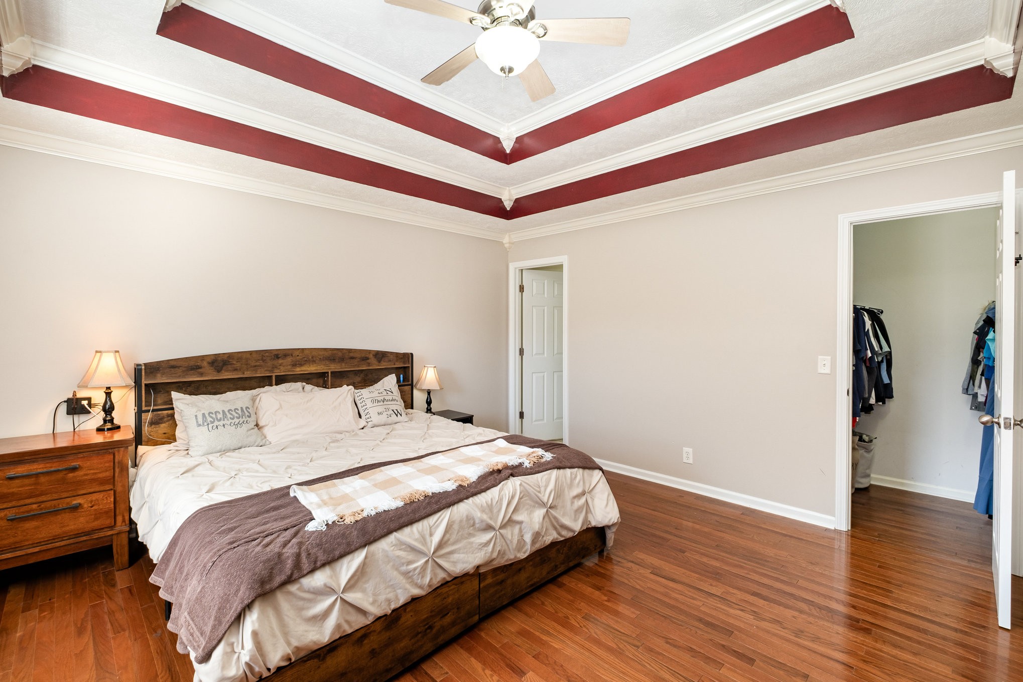 2916 Riley Creek Road Normandy, TN 37360 - Photo 12 of 23 a bedroom with a bed and a chandelier