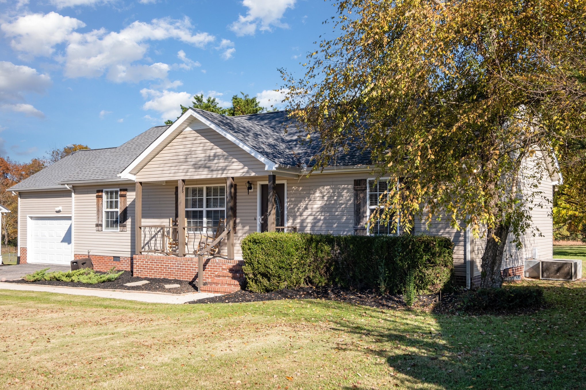 2916 Riley Creek Road Normandy, TN 37360 - Photo 23 of 23 a front view of a house with a garden and tree