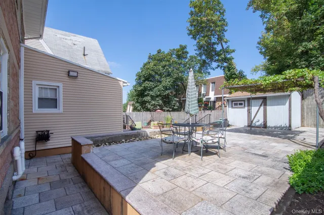 a view of a outdoor space with a patio