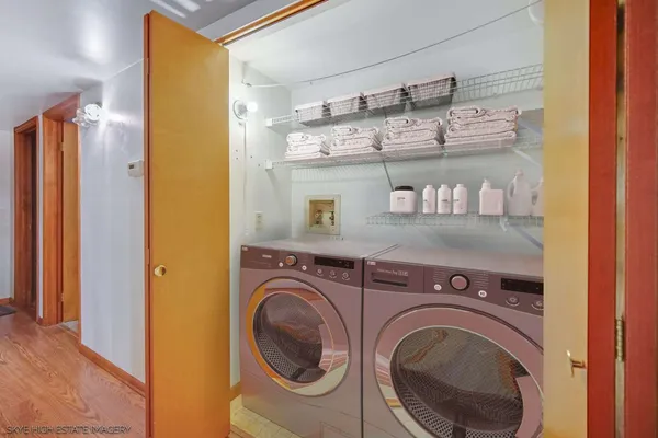 a view of washer and dryer in a utility room