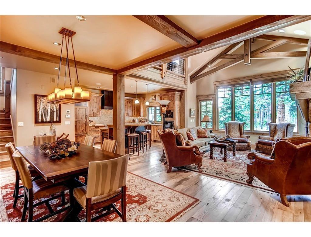 55 Brooks Snider Road Breckenridge, CO 80424 - Photo 3 of 35 a living room with furniture a chandelier and a floor to ceiling window