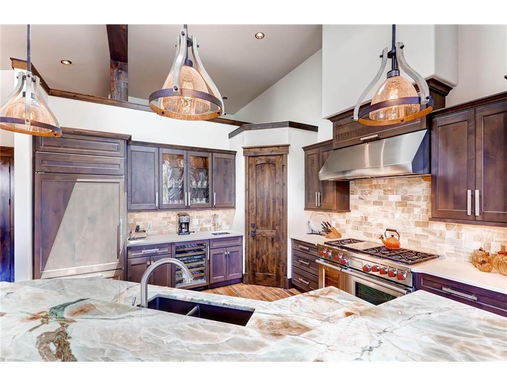 55 Brooks Snider Road Breckenridge, CO 80424 - Photo 29 of 35 a kitchen with stainless steel appliances kitchen island granite countertop a sink and a cabinets