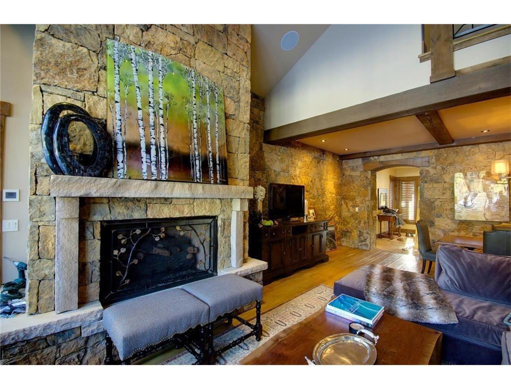 55 Brooks Snider Road Breckenridge, CO 80424 - Photo 9 of 35 a living room with furniture a flat screen tv and a fireplace