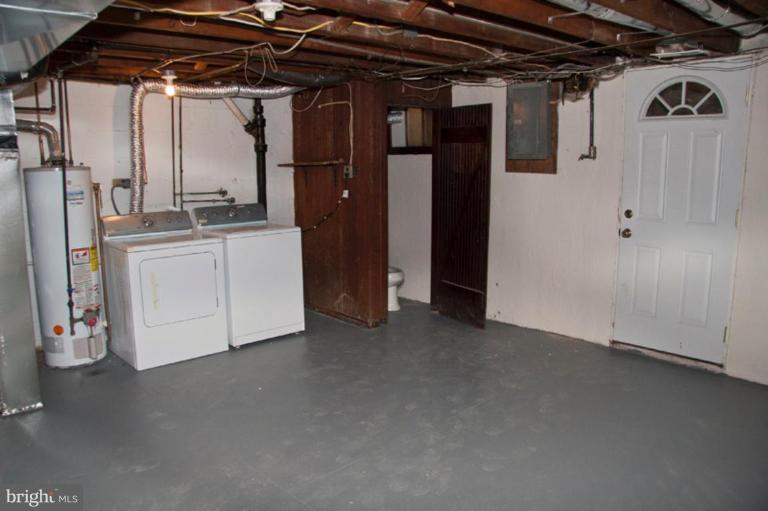 1303 Crofton Road Baltimore, MD 21239 - Photo 10 of 17 a view of a refrigerator and storage