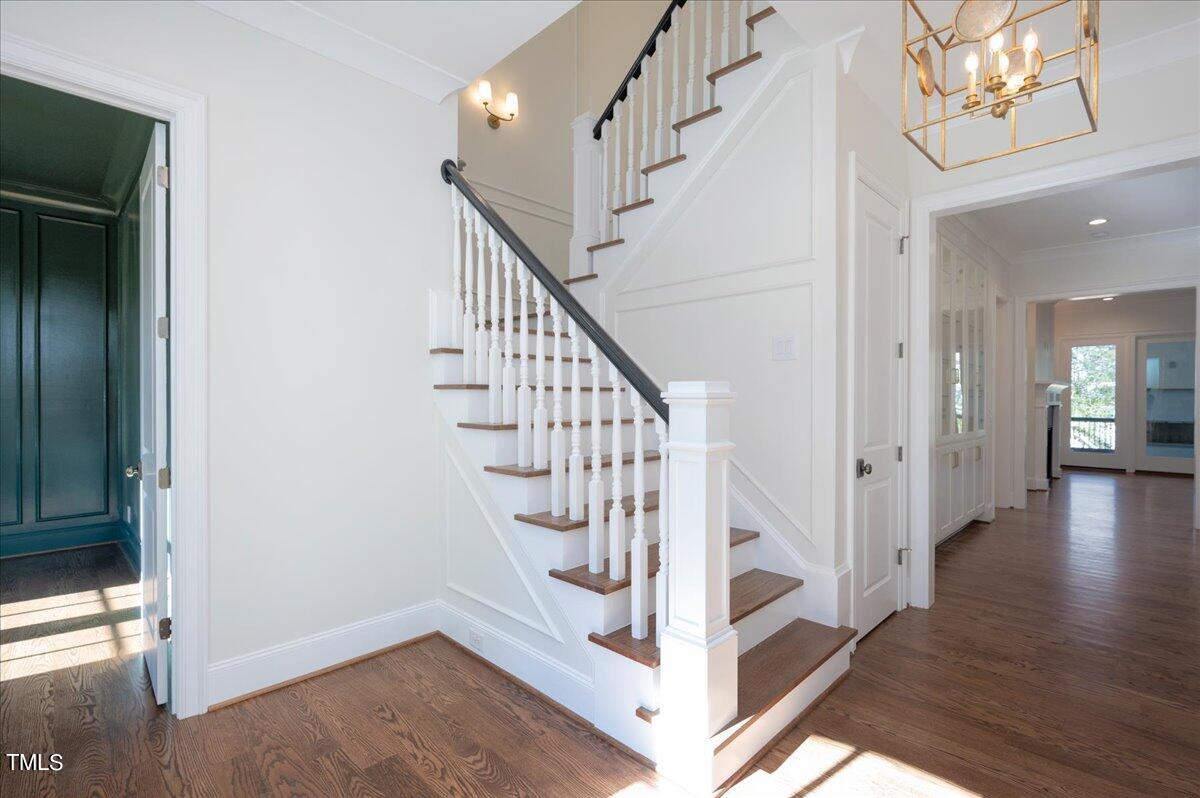 705 Mills Street Raleigh, NC 27608 - Photo 3 of 23 a view of entryway and hall with wooden floor