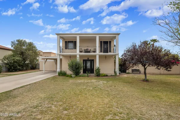 a house view with a garden space