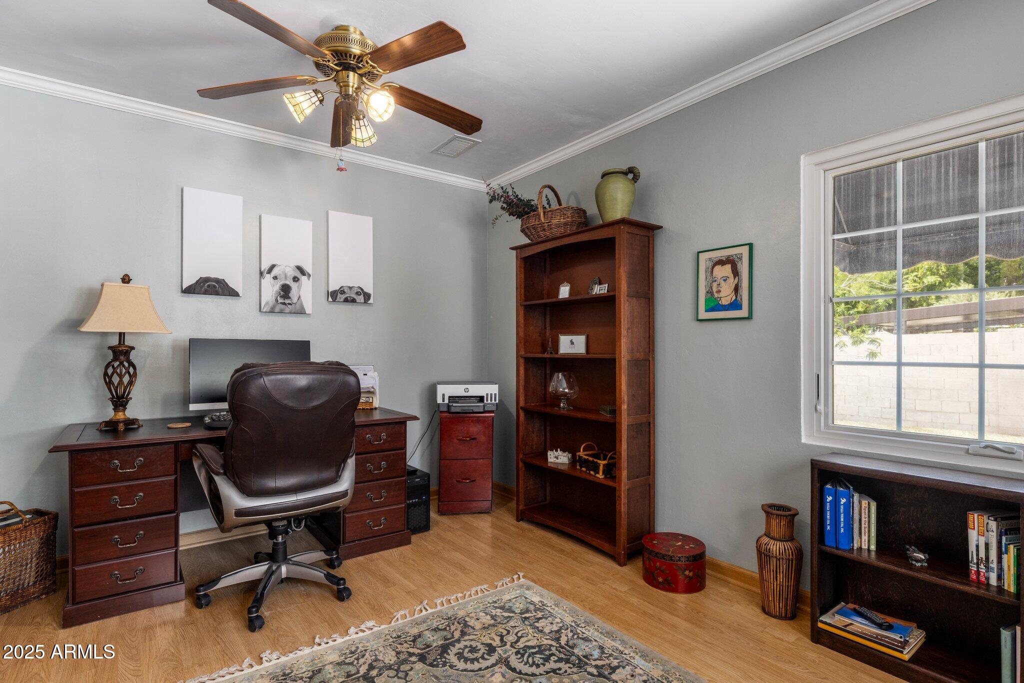 55 East Pierson Street Phoenix, AZ 85012 - Photo 9 of 26 a view of a workspace with furniture and a window