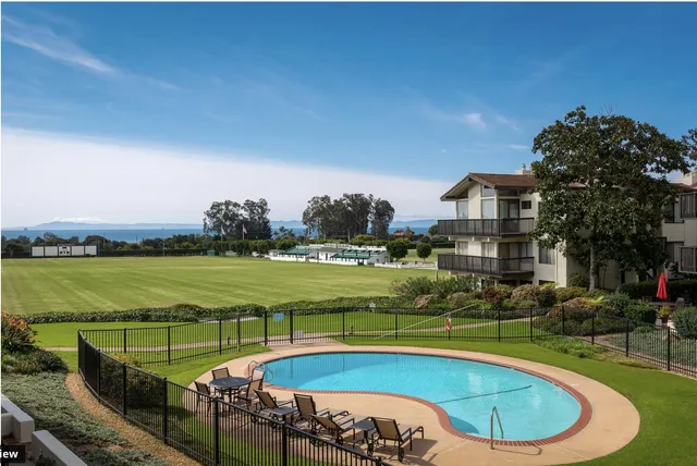 a view of a swimming pool and outdoor space