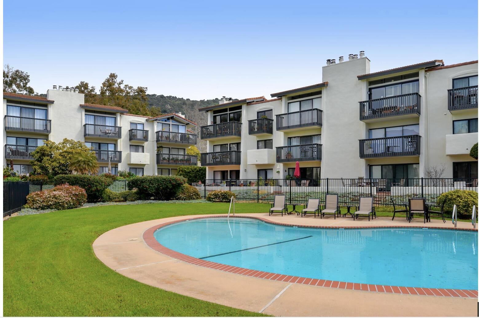 3375 Foothill Road, Unit 624 Carpinteria, CA 93013 - Photo 3 of 14 a view of pool with outdoor seating