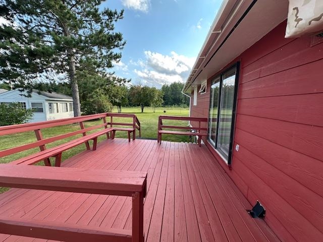 30 Fir Circle Babbitt, MN 55706 - Photo 25 of 27 Deck featuring a lawn