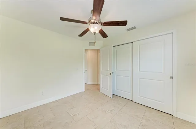 a view of a storage & utility room with two washing machine