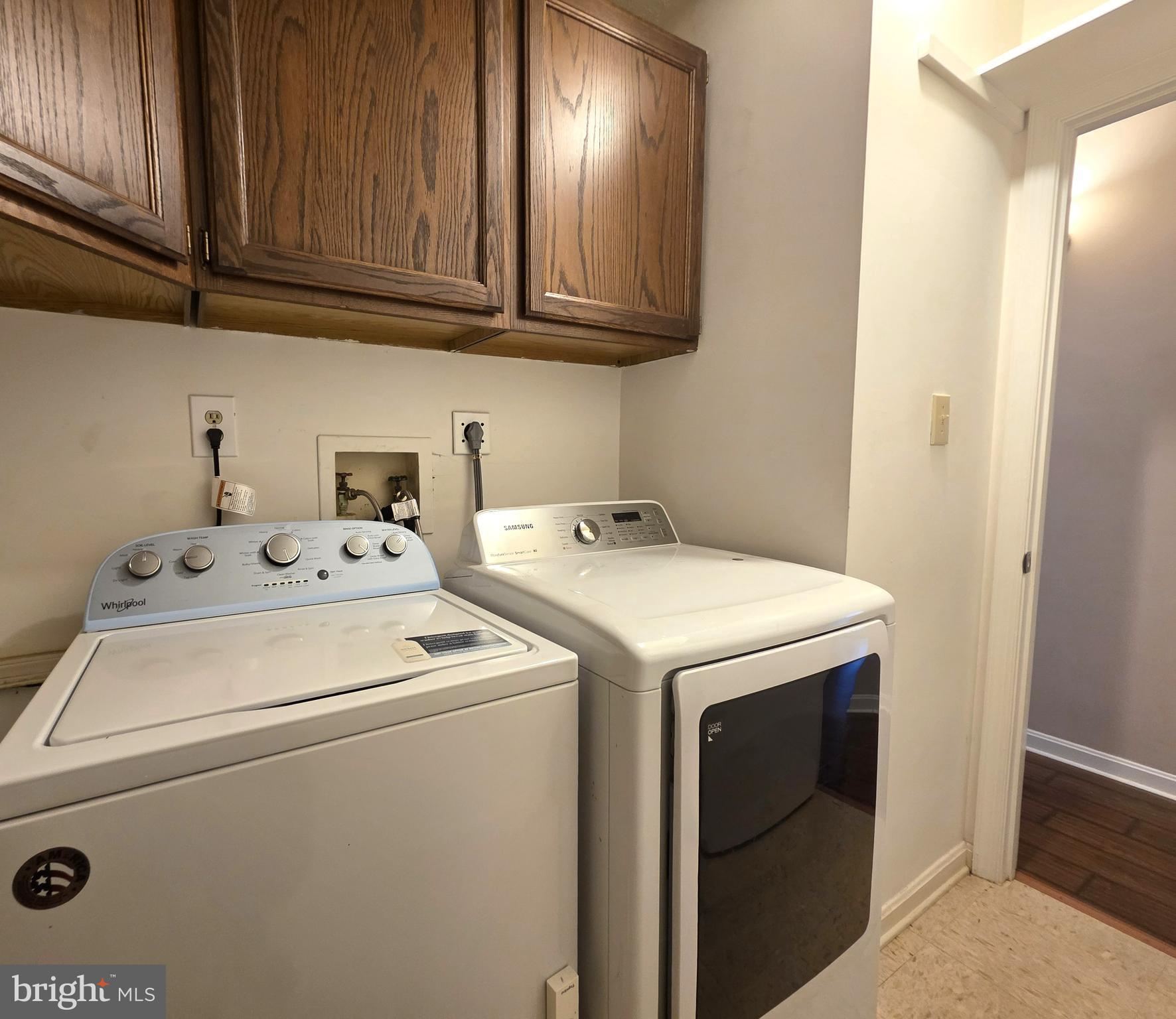 58 Windbrooke Circle, Unit 58 Gaithersburg, MD 20879 - Photo 17 of 28 a utility room with dryer and washer