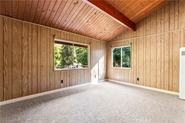 a view of a room with a large window