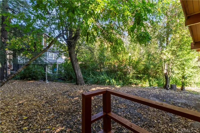 a view of a pathway with a bench