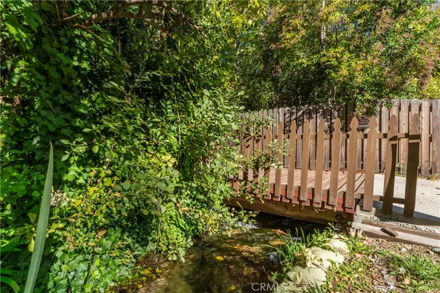a view of a house with a small yard