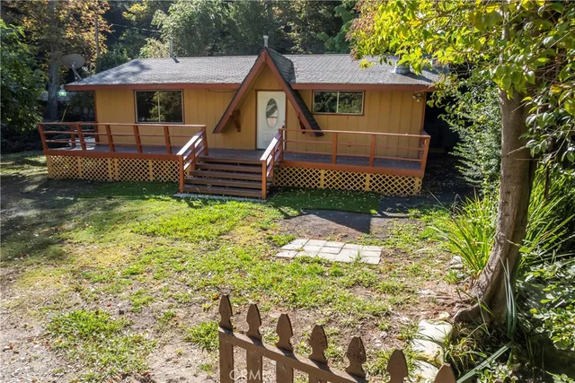 a view of a house with a big yard
