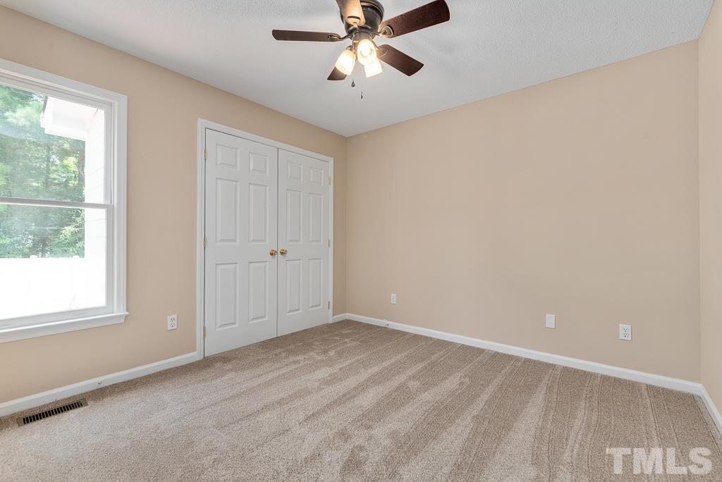 3308 Castlegate Drive Raleigh, NC 27616 - Photo 16 of 22 a view of an empty room with a window