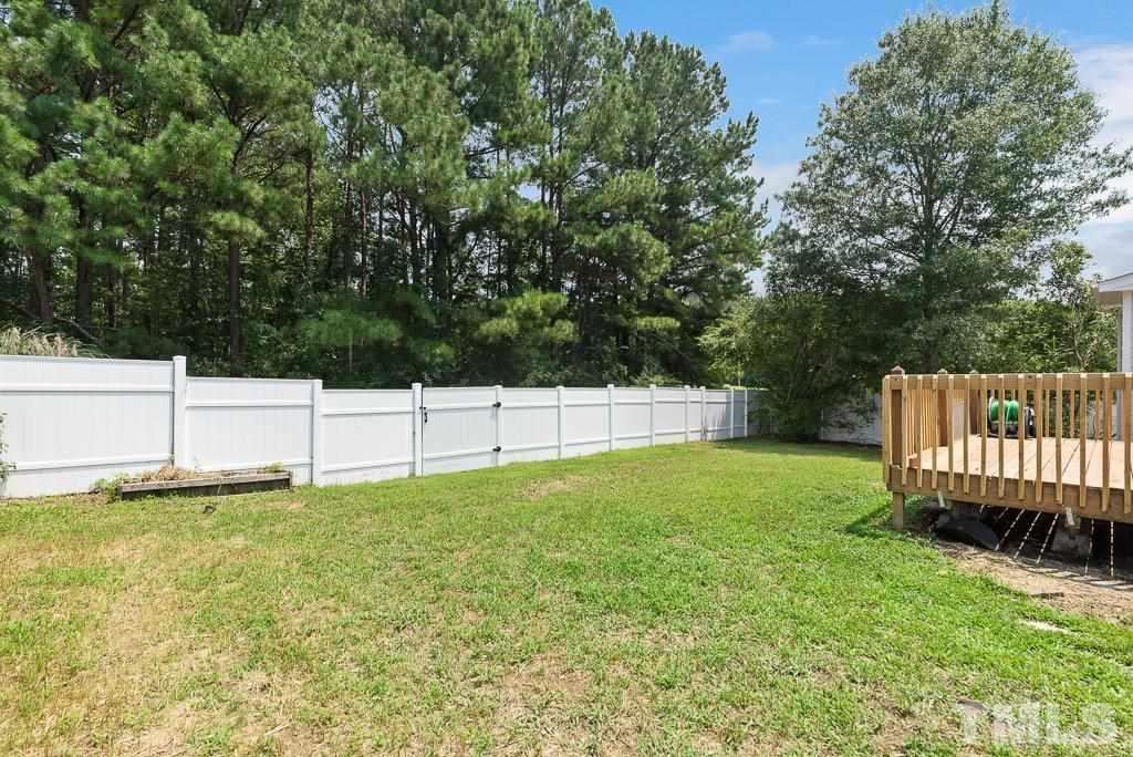 3308 Castlegate Drive Raleigh, NC 27616 - Photo 19 of 22 a view of a backyard