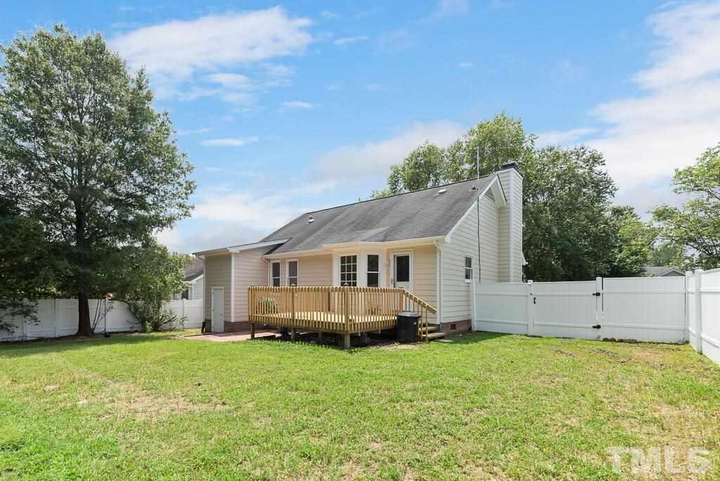 3308 Castlegate Drive Raleigh, NC 27616 - Photo 20 of 22 a view of house with backyard and garden